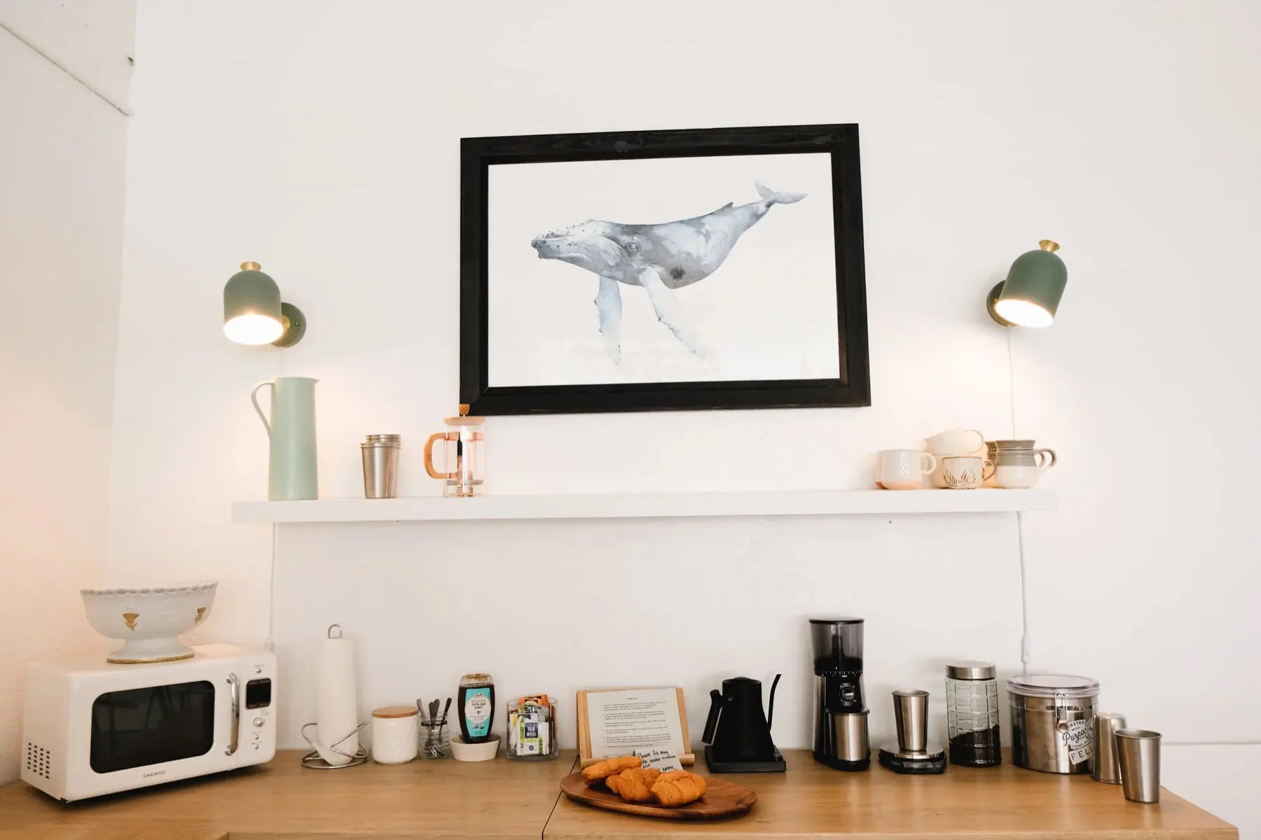 The coffee and tea bar beneath the whale illustration